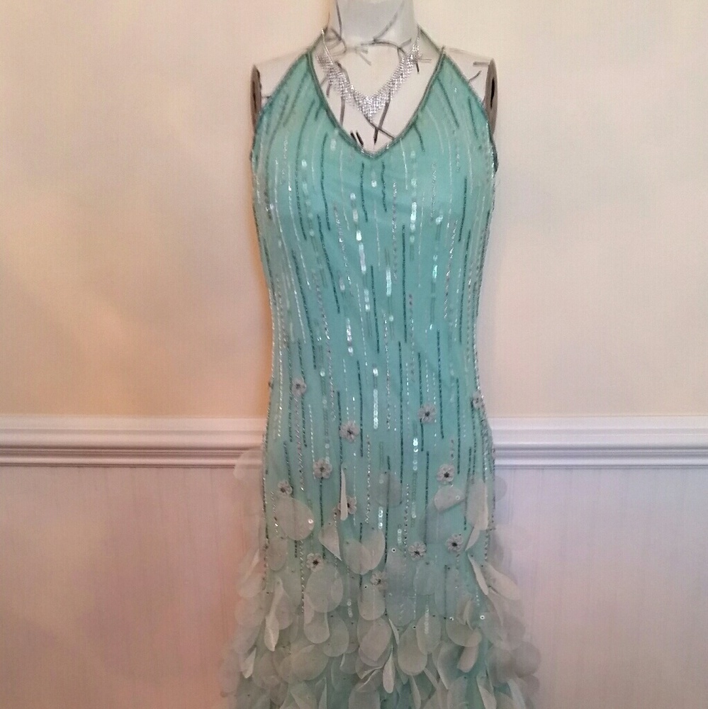 Teal silk beaded and sequin formal gown.